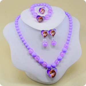 5-delat smyckeset med pärlor och motiv av Snödrottningen i lila