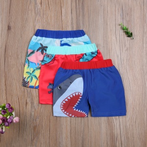 Färgglada tecknade strandshorts för barn med träbotten