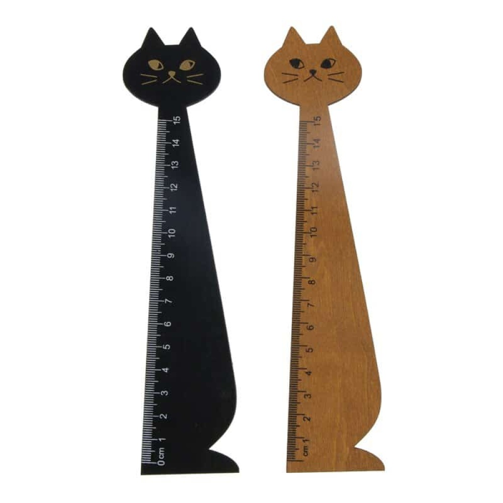 15 cm trälinjal i form av en katt 15 cm trälinjal i form av en svart och brun katt mot en vit bakgrund