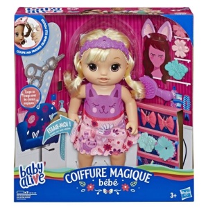 Baby Alive-docka med magiskt blont hår och rosa klänning i ask