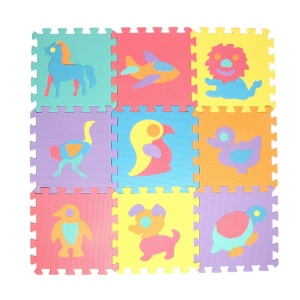 Flerfärgad pusselmatta med skumdjur för barn