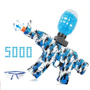 Barnens orbeez-pistol med blå kulor och vit bakgrund