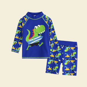 barntröja, blå, med en dinosauriemönster på, bestående av en långärmad T-shirt och shorts